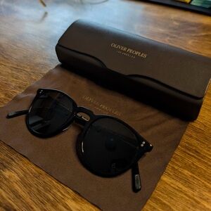 Oliver Peoples Black Round Sunglasses with Case